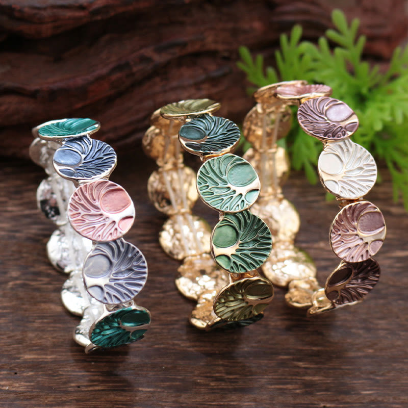 Tree of Life Enamel Alloy Bracelet – three bracelets in different palettes on dark wood, comparison view
