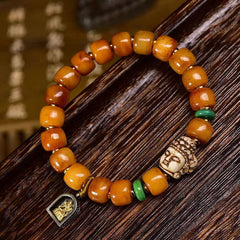 Camel Bone Buddha Bracelet – close-up of intricate Buddha face carving on bone bead