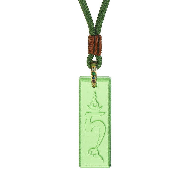 Green Tara Liuli Necklace – close-up of Green Tara serene face in translucent liuli