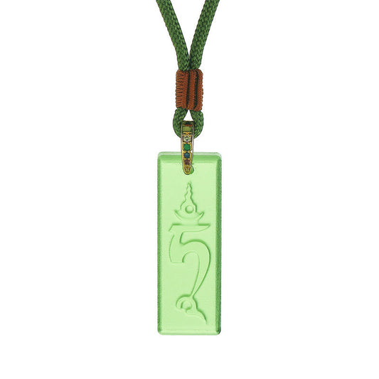 Green Tara Liuli Necklace – close-up of Green Tara serene face in translucent liuli