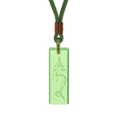 Green Tara Liuli Necklace – close-up of Green Tara serene face in translucent liuli