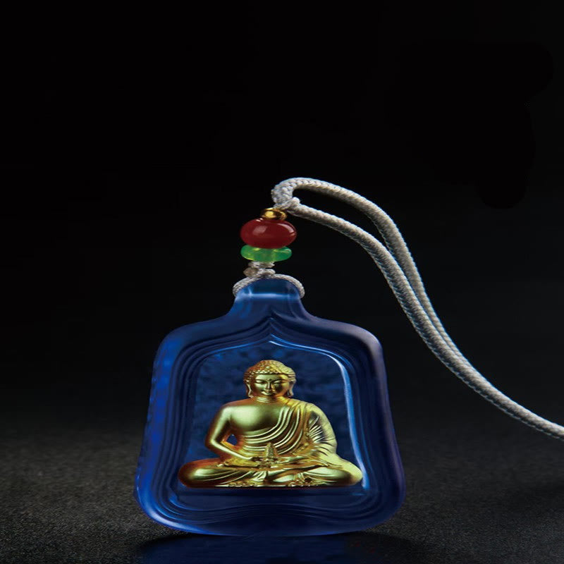 Medicine Buddha Liuli Necklace – pendant glowing in light showing liuli glass inner depth