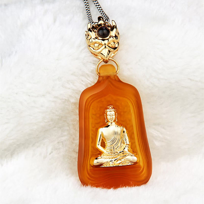 Medicine Buddha Liuli Necklace – side profile of Buddha robe folds in crystal carving
