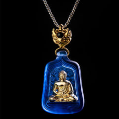Medicine Buddha Liuli Necklace – close-up of translucent blue crystal Medicine Buddha face