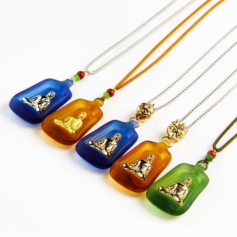 Medicine Buddha Liuli Necklace – layered with other necklaces on mannequin bust display