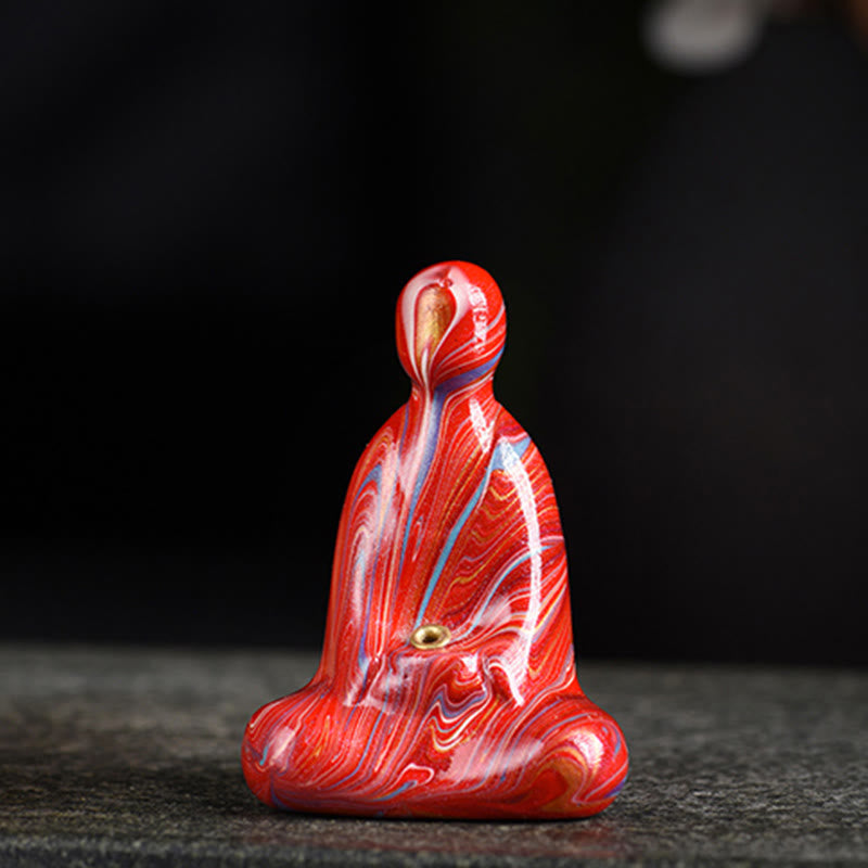 Mini Formless Buddha Incense Holder – hand holding miniature Buddha to show compact size