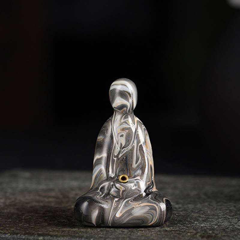 Mini Formless Buddha Incense Holder – beside singing bowl in spiritual altar arrangement