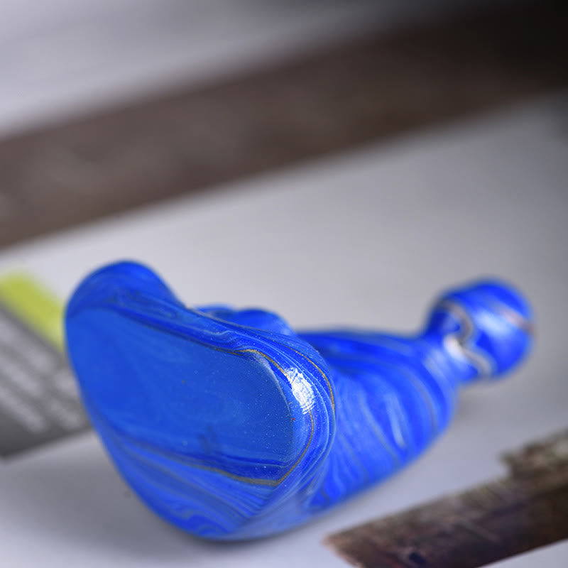 Mini Formless Buddha Incense Holder – lacquer sheen reflecting window light surface detail
