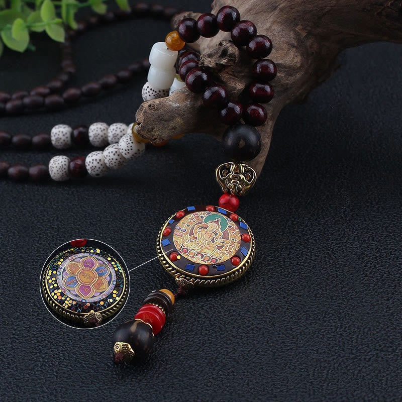 Tibetan Om Mani Padme Hum Necklace – Reversible thangka pendant with deity front and vajra back, wood beads