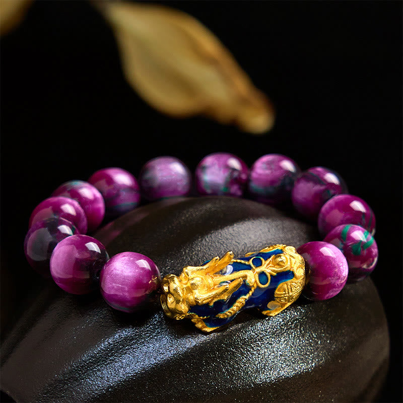 Purple sea willow beads with gold enamel PiXiu on black stone