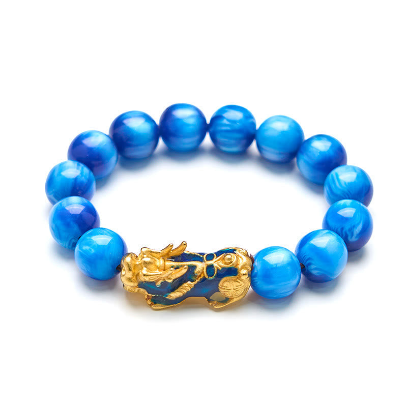 Blue sea willow bracelet flat lay on clean white background