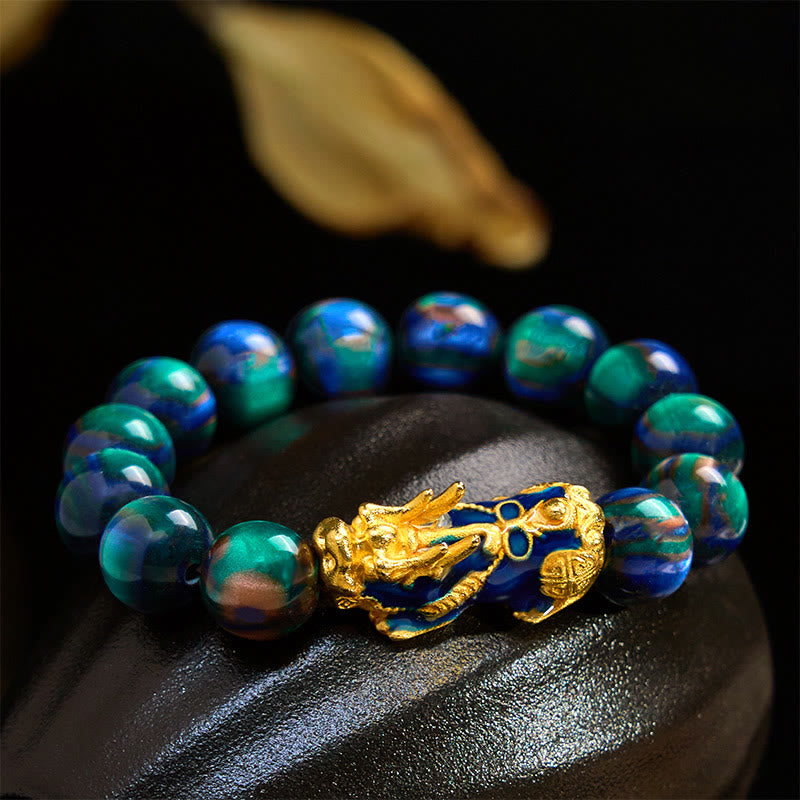 Green-blue sea willow beads with gold enamel PiXiu on black stone