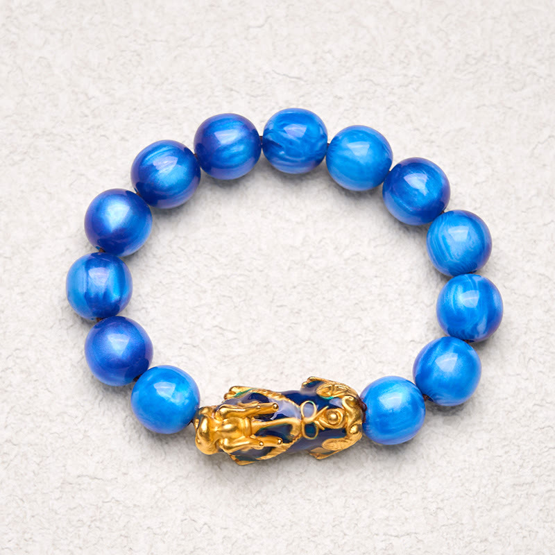 Blue sea willow bracelet on light textured surface, top view