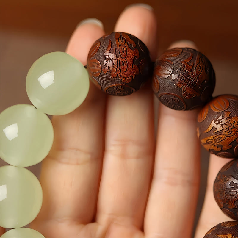 Sappan Wood Engraved Pixiu Fu Bracelet – macro bead detail with symbols and pale jade, natural wood craft bracelet