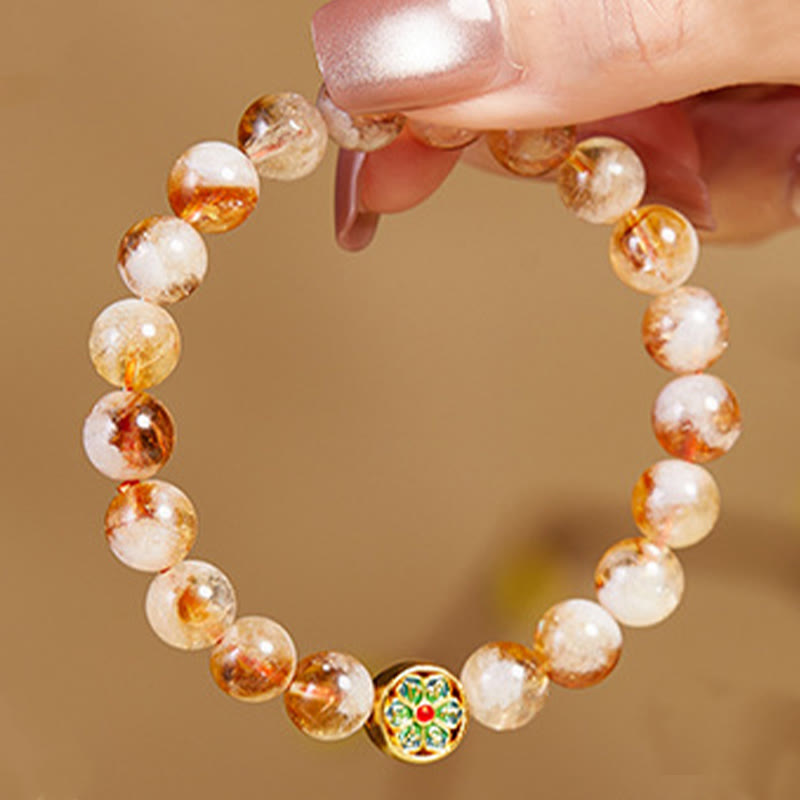 999 Sterling Silver Citrine Om Mani Padme Hum Bracelet – held by hand displaying full bead circumference, unique phantom quartz inclusions in each golden bead, mindfulness jewelry