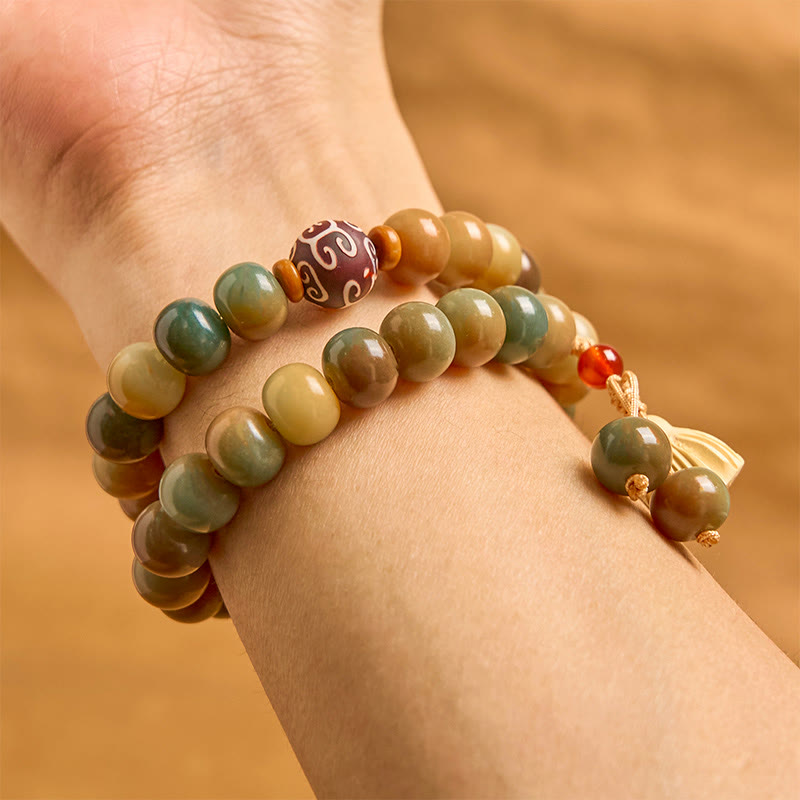 Colorful Bodhi Seed Lotus Pod Double Wrap Bracelet – layered wrist wrap showing earthy bead gradient, bohemian