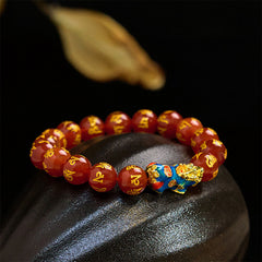 Red Agate PiXiu Color Change Bracelet Om Mani Padme Hum – bracelet on black stone with golden leaf accent, spiritual good luck