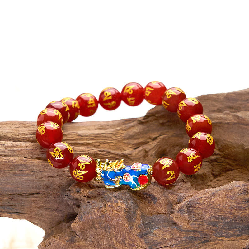 Red Agate PiXiu Color Change Bracelet Om Mani Padme Hum – side view on natural wood rock white backdrop, agate wealth bracelet