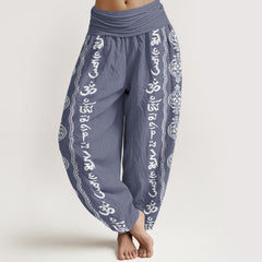 Cotton Mandala Om Harem Pants – slate blue with white Sanskrit print, 3/4 angle on model, boho yoga pants