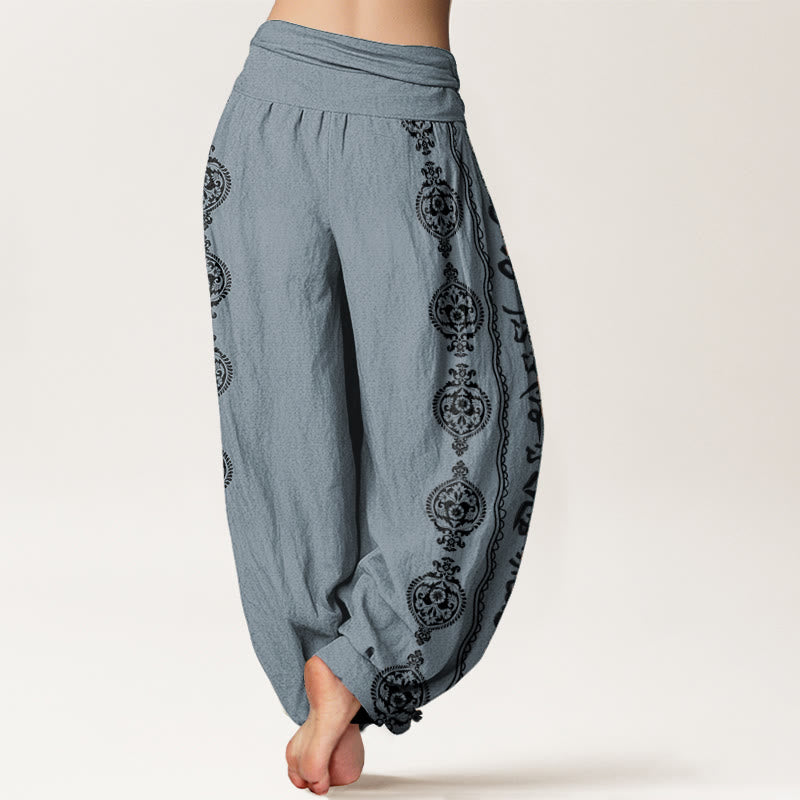 Cotton Mandala Om Harem Pants – slate blue side view with black floral print, demonstrating movement drape, boho pants