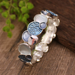 Tree of Life Alloy Elastic Bracelet – blue-toned enamel on weathered wood, sky blue medallion, elevated