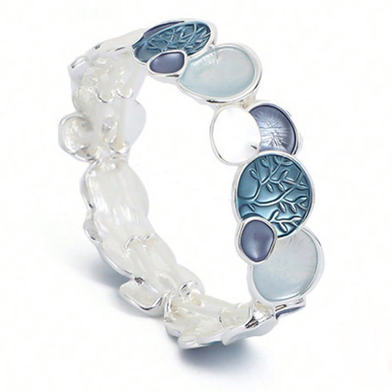 Tree of Life Alloy Elastic Bracelet – teal enamel on white showing elastic band, three-quarter stretch view