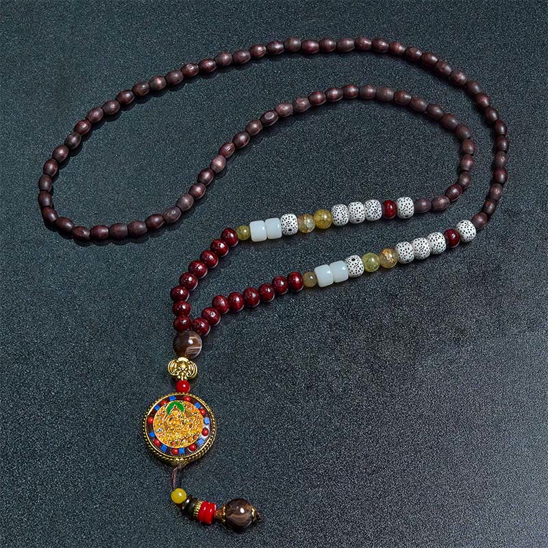 Tibetan Om Mani Padme Hum Necklace – Overhead flat lay, lotus mandala thangka pendant, wood bead mala strand