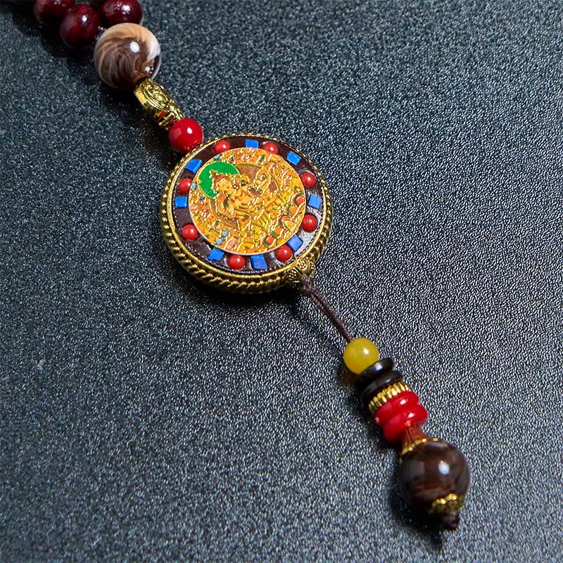 Tibetan Om Mani Padme Hum Necklace – Circular enameled medallion with seated deity, red and blue inlay border