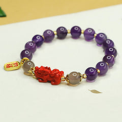 Amethyst Cinnabar Pi Xiu Fu Character Balance Bracelet – side view of purple beads bracelet with red Pixiu charm and gold accent, good luck jewelry
