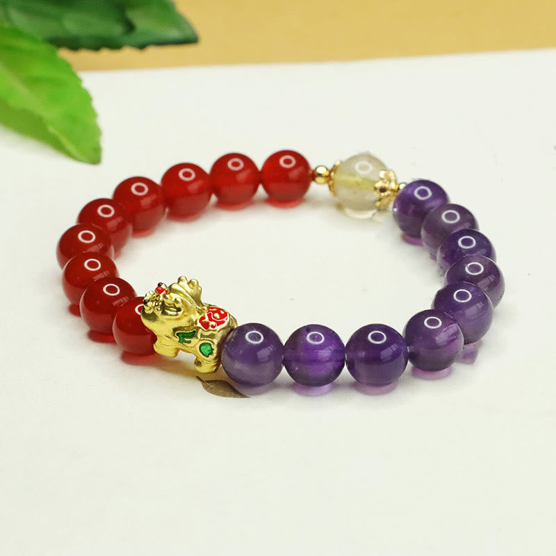 Natural Amethyst Red Agate PiXiu Balance Bracelet – side angle gold PiXiu, clear spacer bead, red agate amethyst bracelet