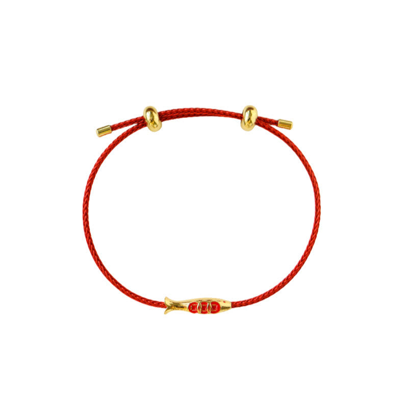 Brass Koi Fish Red String Bracelet – flat lay on white background, gold fish charm, sliding knot closure, adjustable red cord
