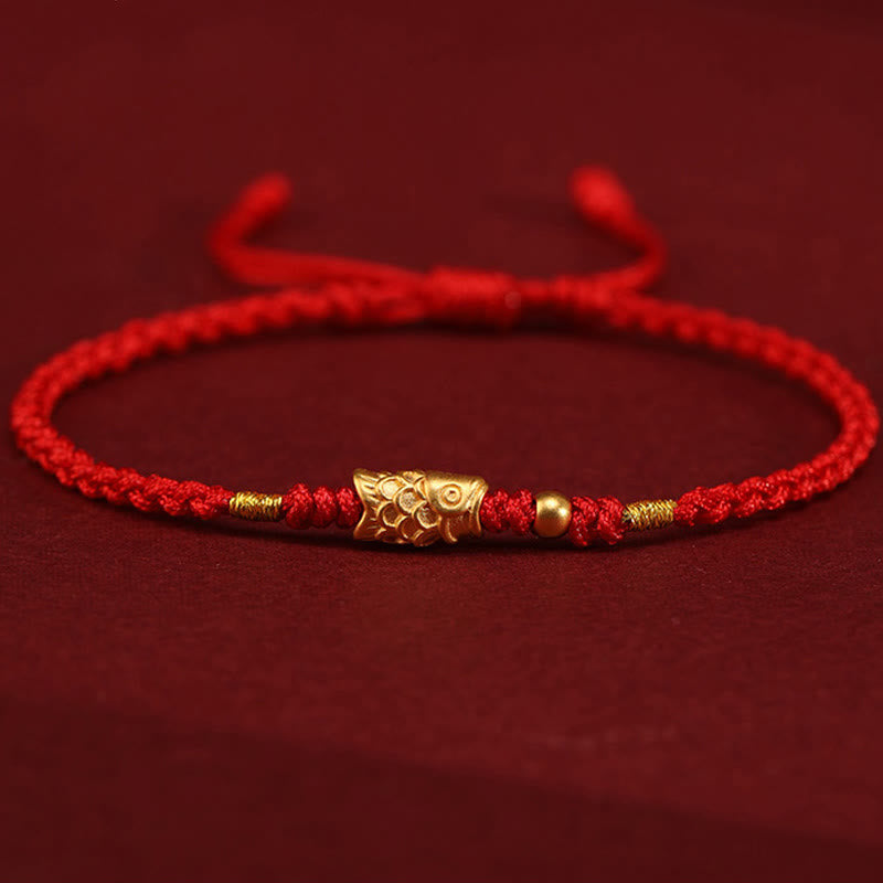 999 Gold Koi Fish Red String Bracelet – 3D gold koi charm facing right, gold bead, low view, luck jewelry