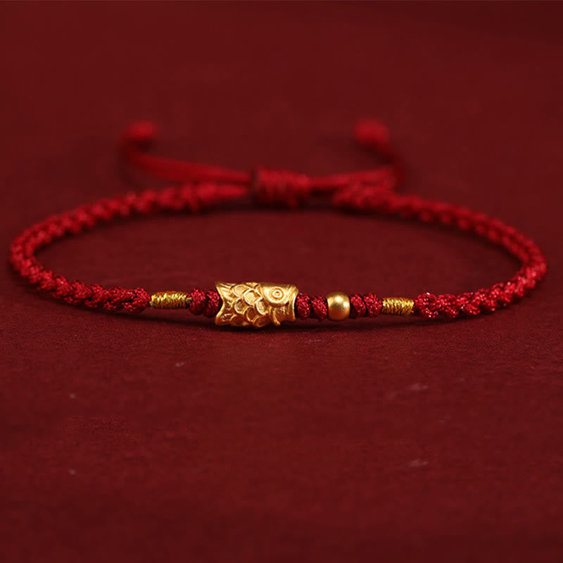 999 Gold Koi Fish Red String Bracelet – gold koi head charm with scales, low side angle, burgundy bg