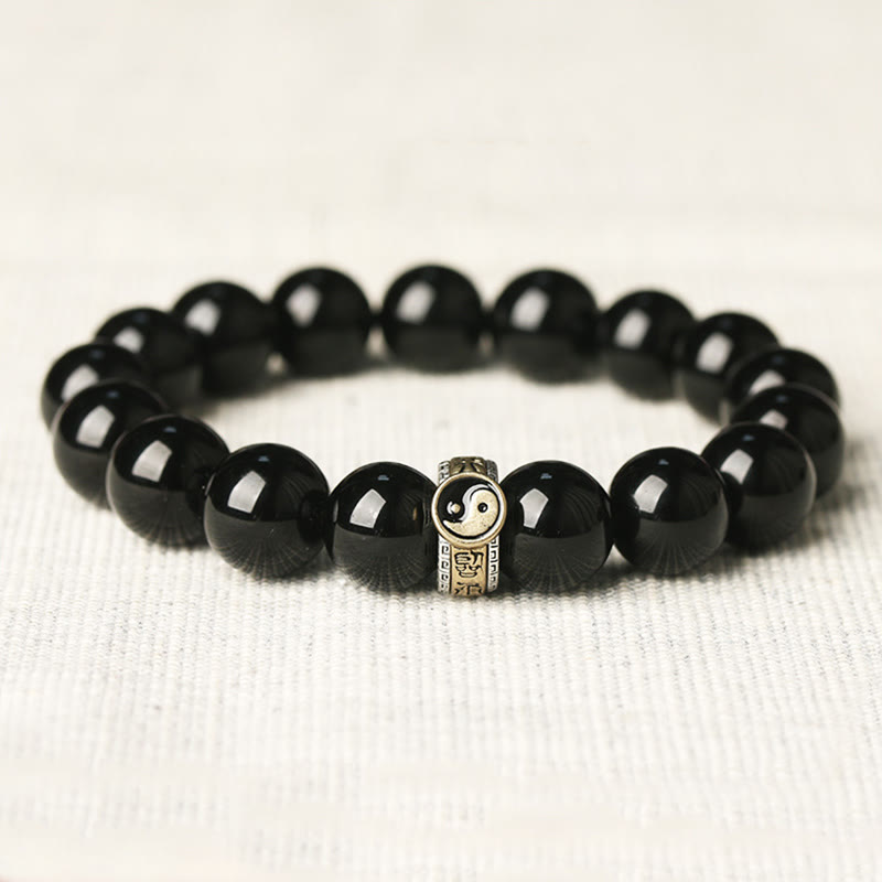 Black Obsidian Nine-Character Mantra Yin Yang Bracelet - gold yin-yang charm on black beads, spiritual jewelry