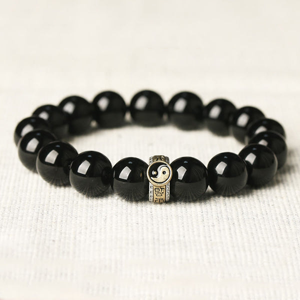 Black Obsidian Nine-Character Mantra Yin Yang Bracelet - gold yin-yang charm on black beads, spiritual jewelry