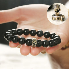 Black Obsidian Nine-Character Mantra Yin Yang Bracelet - on hand with charm detail inset, men's spiritual jewelry