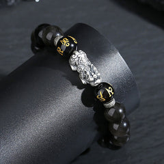 999 Sterling Silver Black Obsidian PiXiu Strength Bracelet – side close-up curved stand, carved PiXiu detail, protection gift