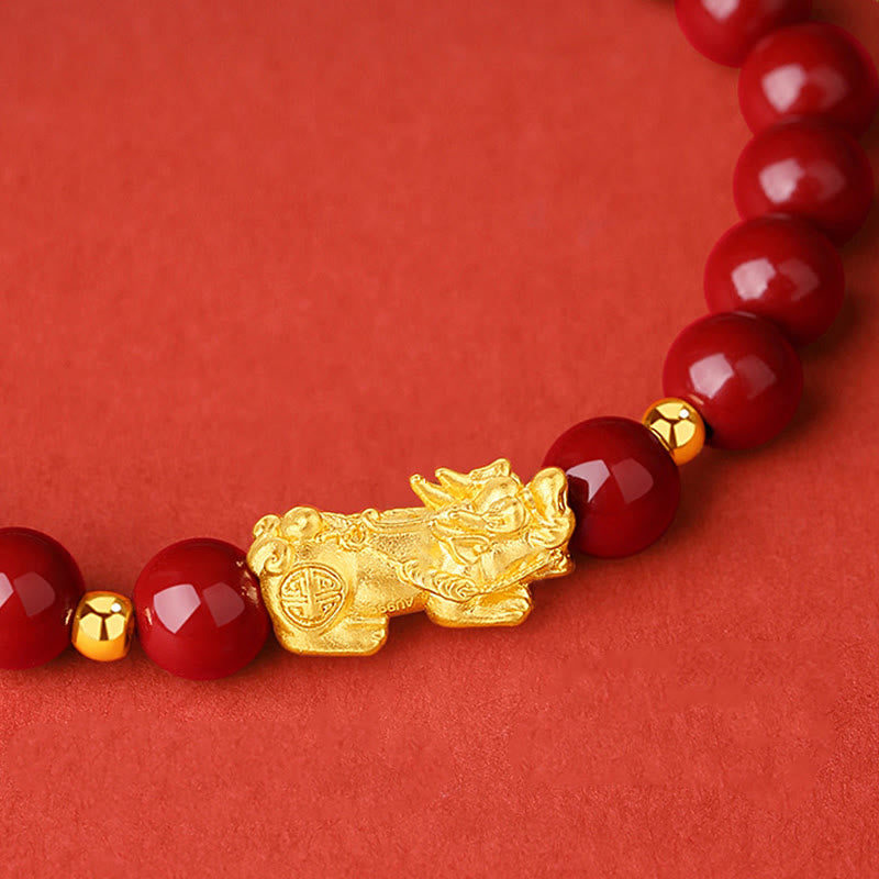 999 Gold Cinnabar PiXiu bracelet – gold PiXiu charm closeup with red beads, 5D hard gold feng shui
