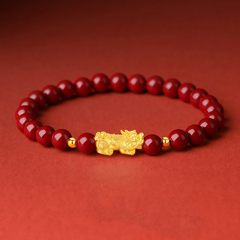999 Gold Cinnabar PiXiu bracelet – red cinnabar beads with gold PiXiu on red background, feng shui wealth