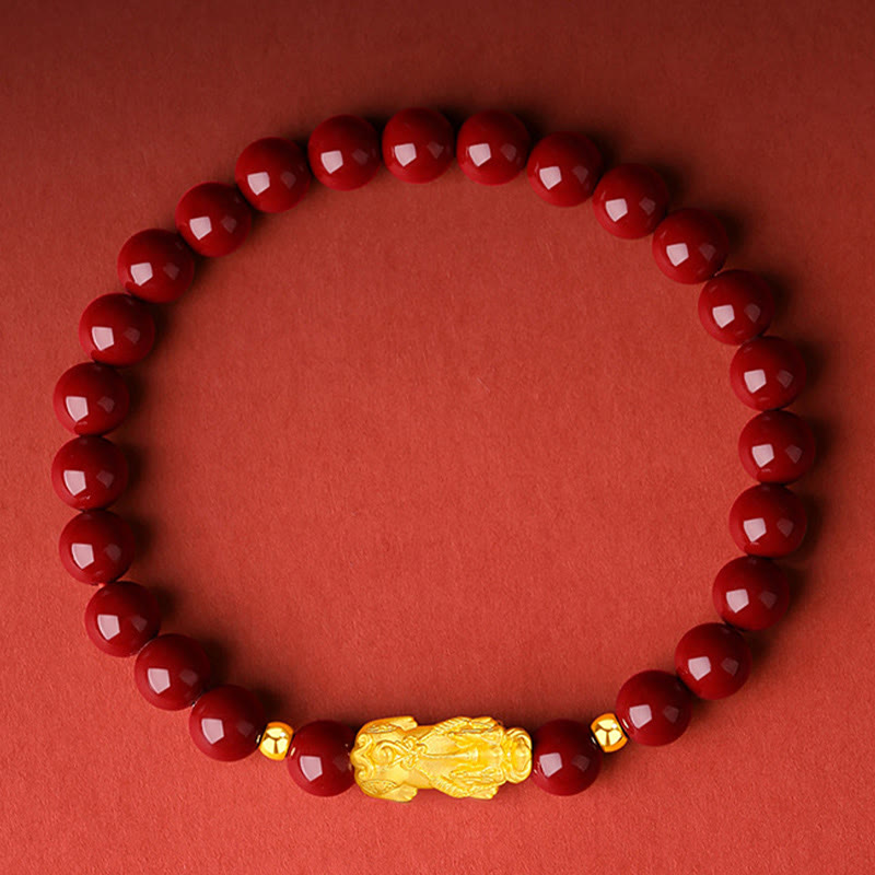 999 Gold Cinnabar PiXiu bracelet – top view red cinnabar beads with gold charm, calm good luck jewelry