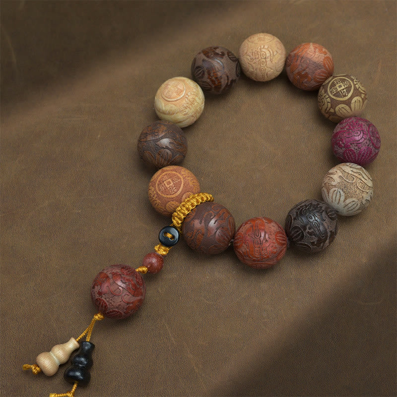 Sandalwood Dragon Phoenix Zodiac Bracelet – full view with gold tassel gourd pendant, Blessing