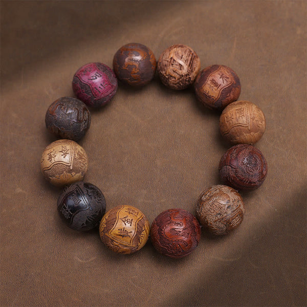 Sandalwood Dragon Phoenix Zodiac Bracelet – glossy carved beads flat lay brown, Craftsmanship