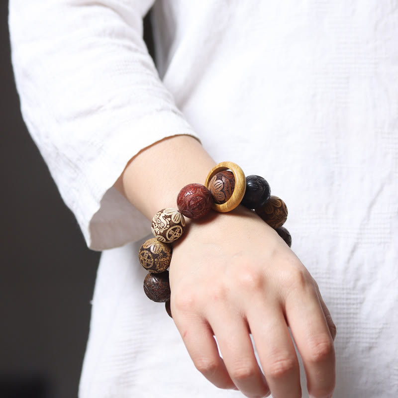 Sandalwood Dragon Phoenix Zodiac Bracelet – worn on wrist relaxed hand white, Serenity
