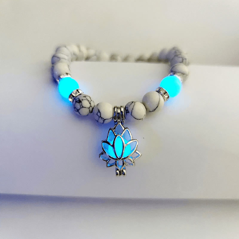 Tibetan Turquoise Glowstone Lotus Bracelet – white howlite beads with cyan glowing lotus pendant on wrist, glowstone bracelet