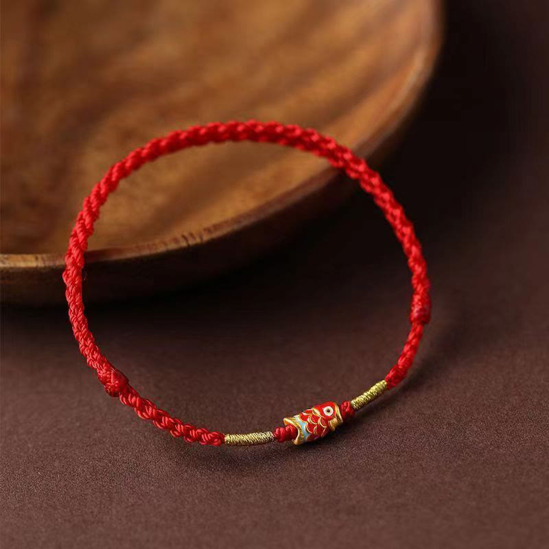 Koi Fish Braided Red String Bracelet – koi charm with gold and teal accents, gold thread wrap, three-quarter