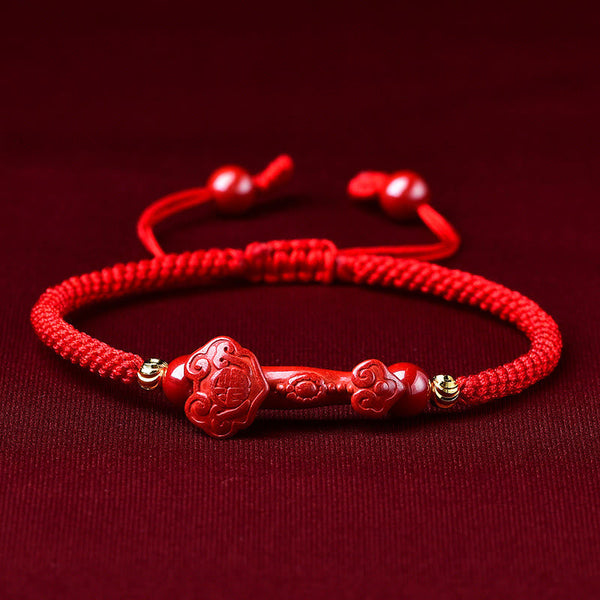 Handcrafted Cinnabar Ruyi bracelet – red braided cord with cinnabar Ruyi stick charm, good fortune