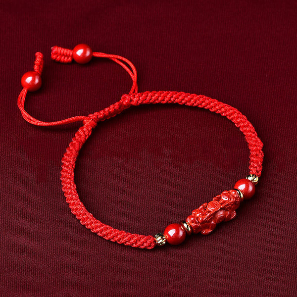 Handcrafted Cinnabar PiXiu bracelet – red braided bracelet side view with adjustable knots, good luck