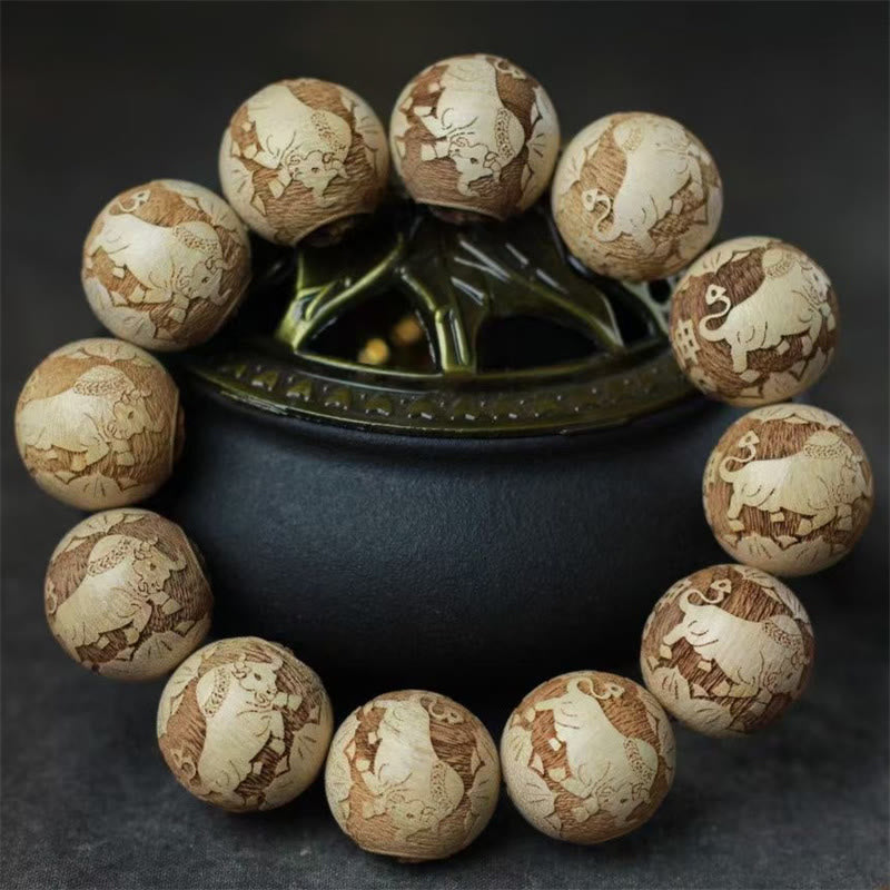 Camphor Wood Yin Yang Ox Engraved Bracelet - elephant motif carved beads circular display, wood jewelry