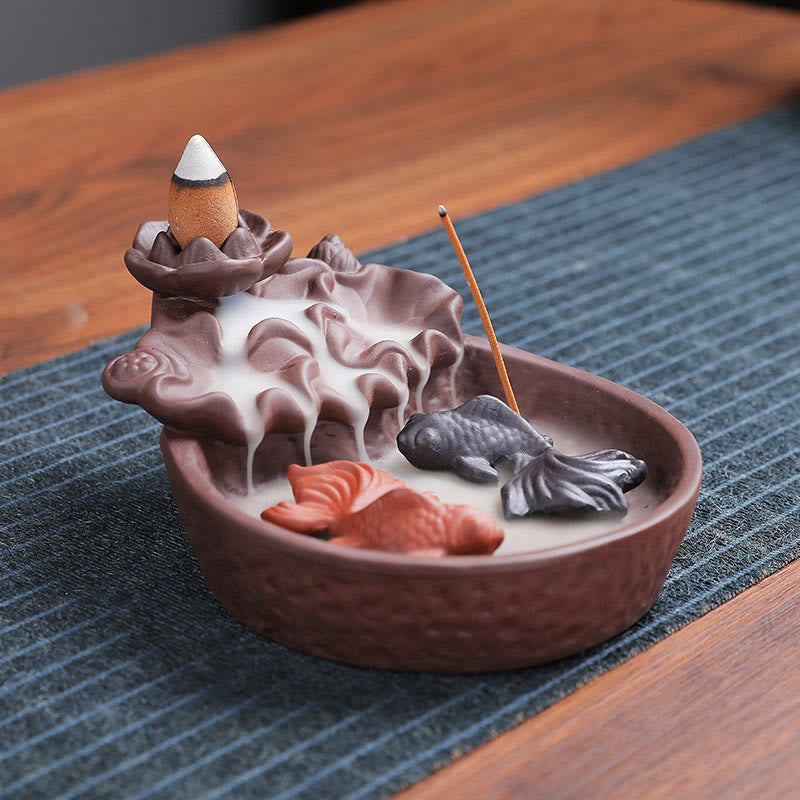 Koi Fish Ox Purple Clay Incense Burner – lotus pond motif, two koi in smoke, blue-green mat, backflow