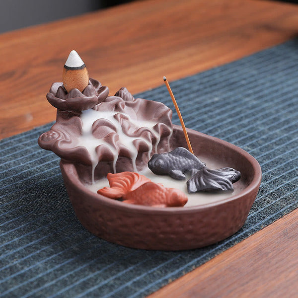 Koi Fish Ox Purple Clay Incense Burner – lotus pond motif, two koi in smoke, blue-green mat, backflow